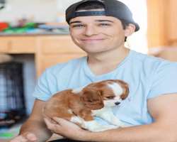 He is very fond of dogs and has a pet dog.